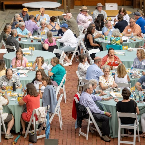 Guests enjoy Feast of Reason in the Monticello visitor center courtyard